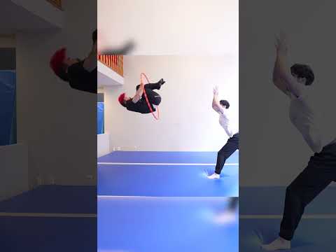 Backflip through hoop challenge 🔥 @team1llusion