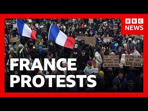 French police arrest 135 people, as tens of thousands protest across country | BBC News