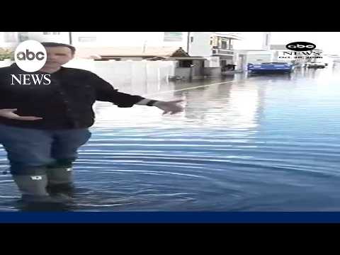 Record-breaking king tides lash both coasts